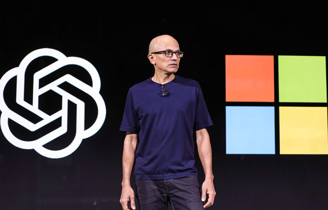 Satya Nadella spune că firmele plătesc de două ori când folosesc AI extern